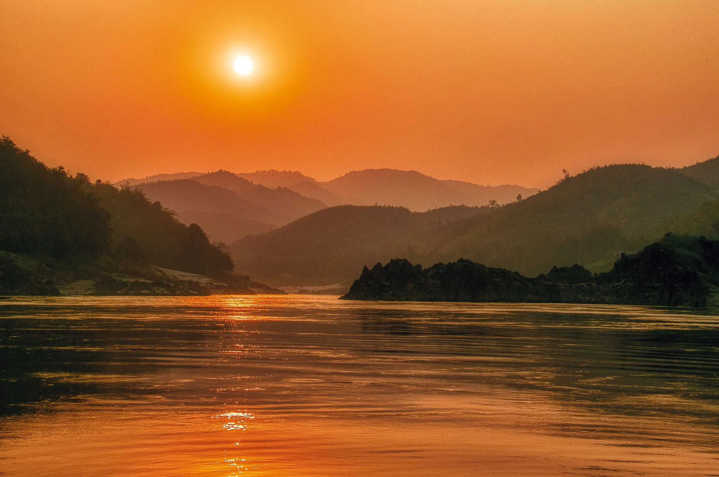 The Mekong River at sunset in Bokeo Province, Laos, the province Huay Xai sits in